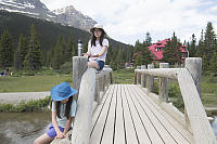 Small Bridge With The Lodge At Bow Lake