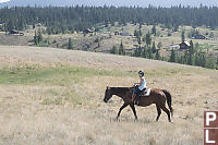 Claira Walking In Front Of Ranch