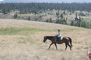 Claira Walking In Front Of Ranch