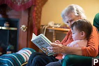 Claira And Grandma Reading ABook