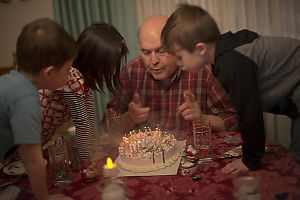 Lots Of Help Blowing Out Candles