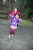 Nara On The Swing With Grandma Behind