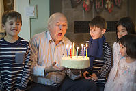 Grandpa Blowing Out His Candles