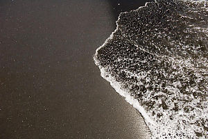 Black Sand With Bubbly Water