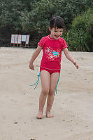 Claira Walking On Beach