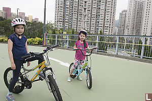 Nara And Claira Pause Biking