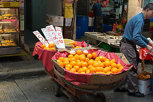 Oranges For Sale On Mobile Cart