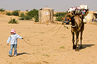Girl Leading Camel