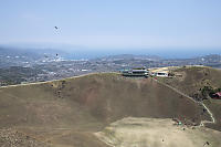 Three Kits Flying Over Caldera