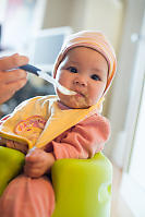 Mom Feeding Claira Her First Meal