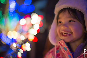 Claira Smiling With Bokeh Lights