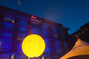 Moon Lantern And Lit Building