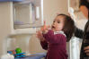 Nara Playing In Kitchen