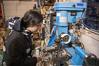 Claira Training To Use Lathe