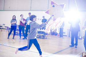 Marcus Hitting Piñata With Flash Going Off
