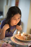 Nara Blowing Out Candles