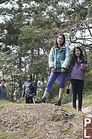 Kids Standing On Rock