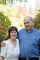 Parents With ATower Behind