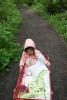 Claira Looking Up At Nara In Wagon