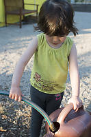 Claira Filling AWatering Can