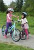 High Five For Riding Her Bike