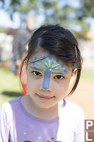 Claira With Peacock Facepaint