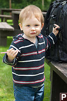 James With A Straw And Camera Bag