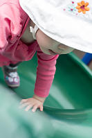 Claira Climbing Up The Curly Slide