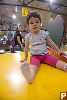 Claira Sliding Down Yellow Slide