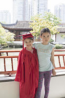 Claira And Older Sister In Gown