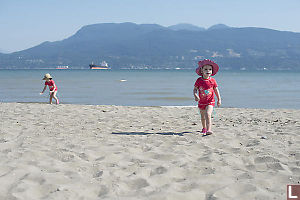 Walking On The Sand At Spanish Banks