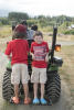 Boys On Back Of Tractor
