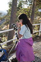 Claira Looking Through Solar Masked Telescope