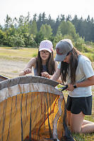 Nara And Claira Setting Up Tent