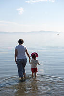 Grandma And Nara Walking Into Ocean