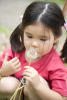 Nara Blowing Dandelion