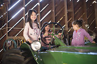 Kids Playing On Tractor