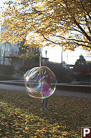 Claira Looking Through Bubble