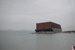 Barge On The Rocks