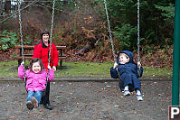 Happy Kids In The Swings