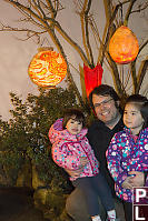 Dad And The Kids With Lanterns