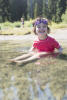 Claira Sitting In Shallow Water