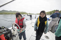 Claira Driving The Boat