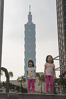 Kids With Taipei 101 Behind